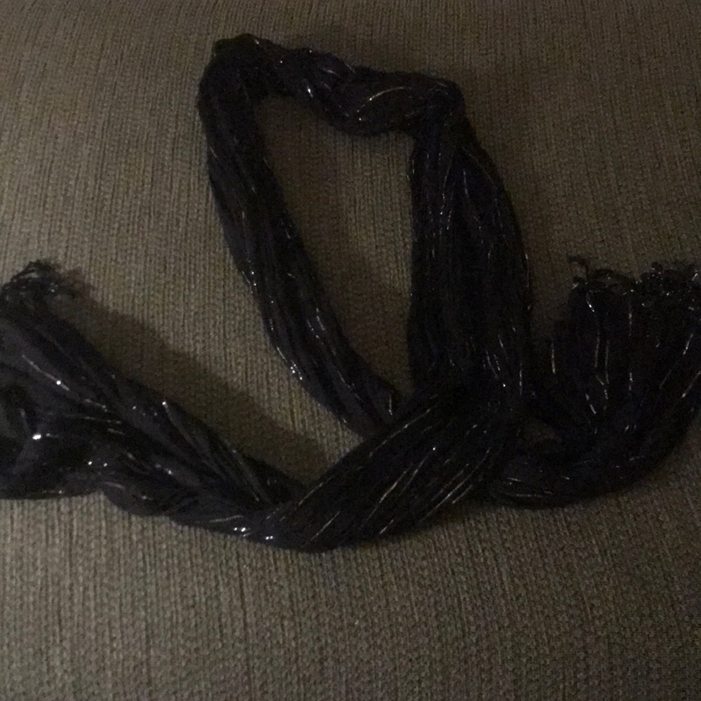 Black and silver scarf. EUC